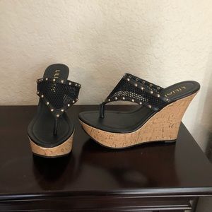 Black and cork flip flop wedges